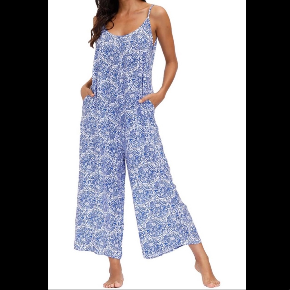Brand new, Small Romper with wide leg pants & two pockets